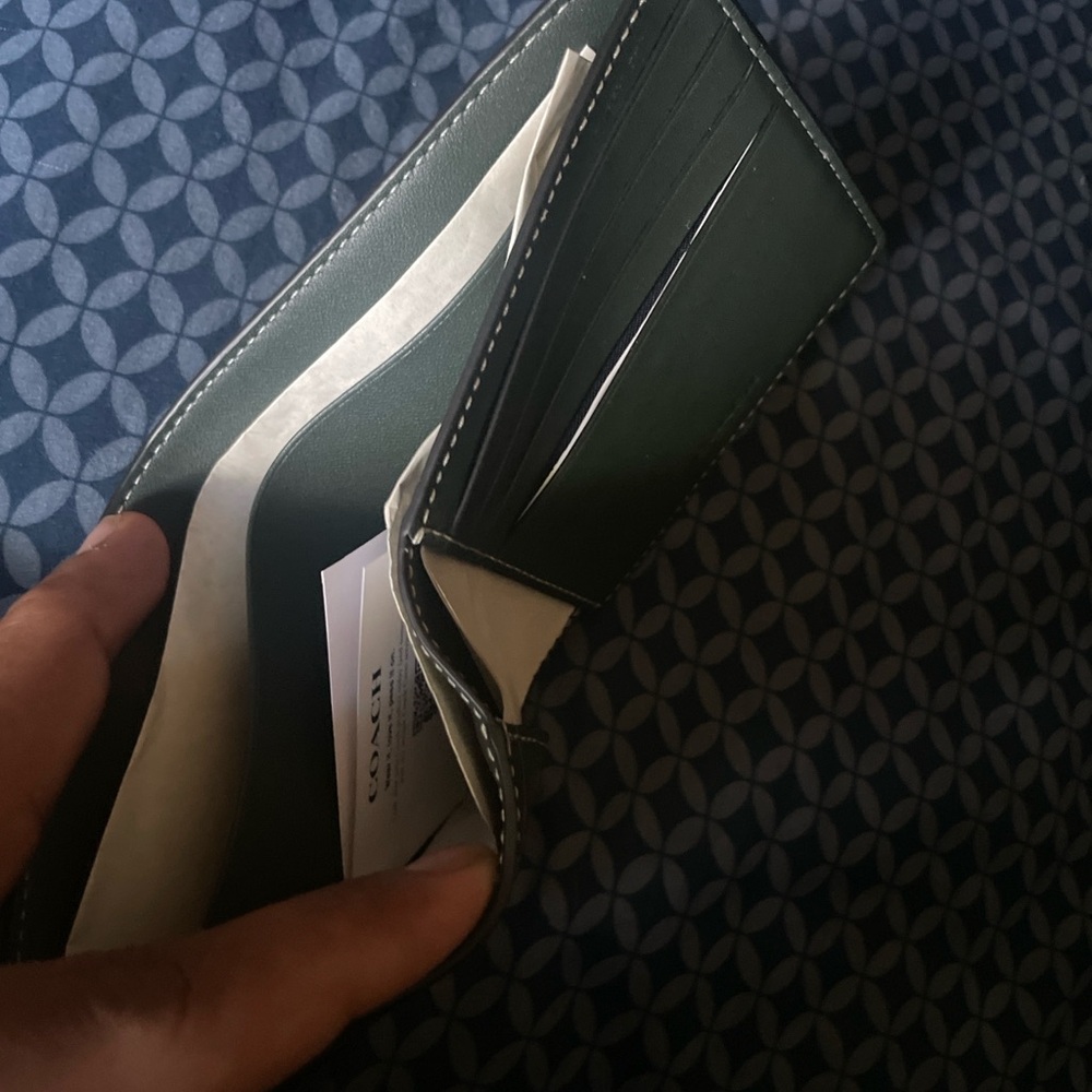 Men’s coach wallet . Green